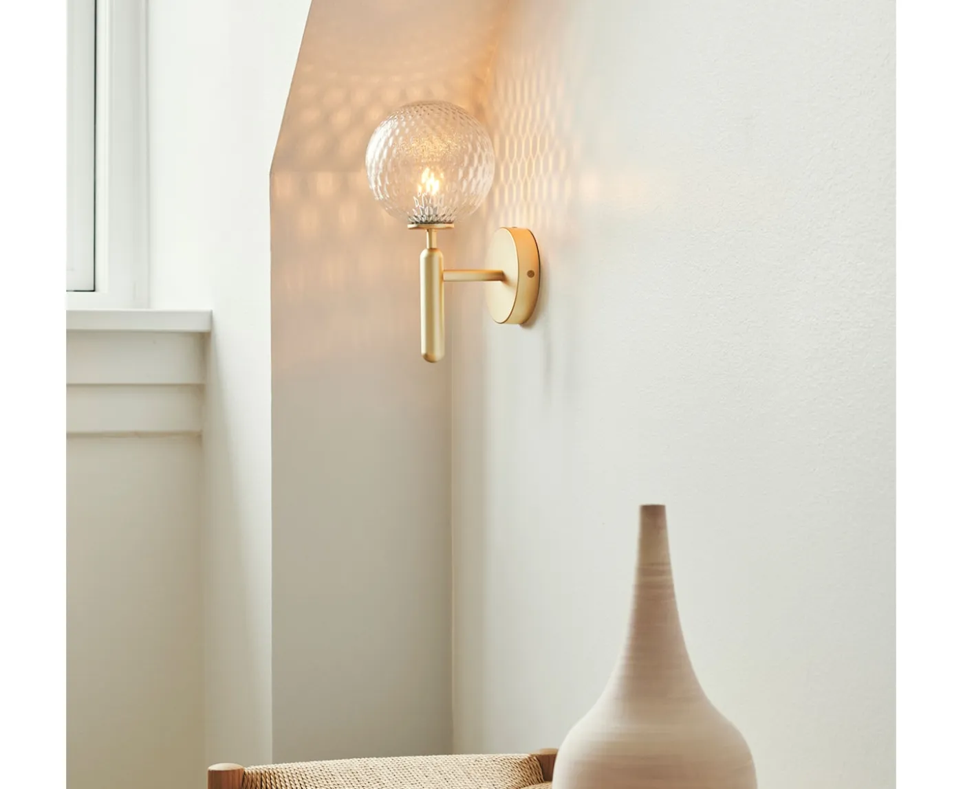 Nuura Miira Vägglampa Brass/Optic Clear